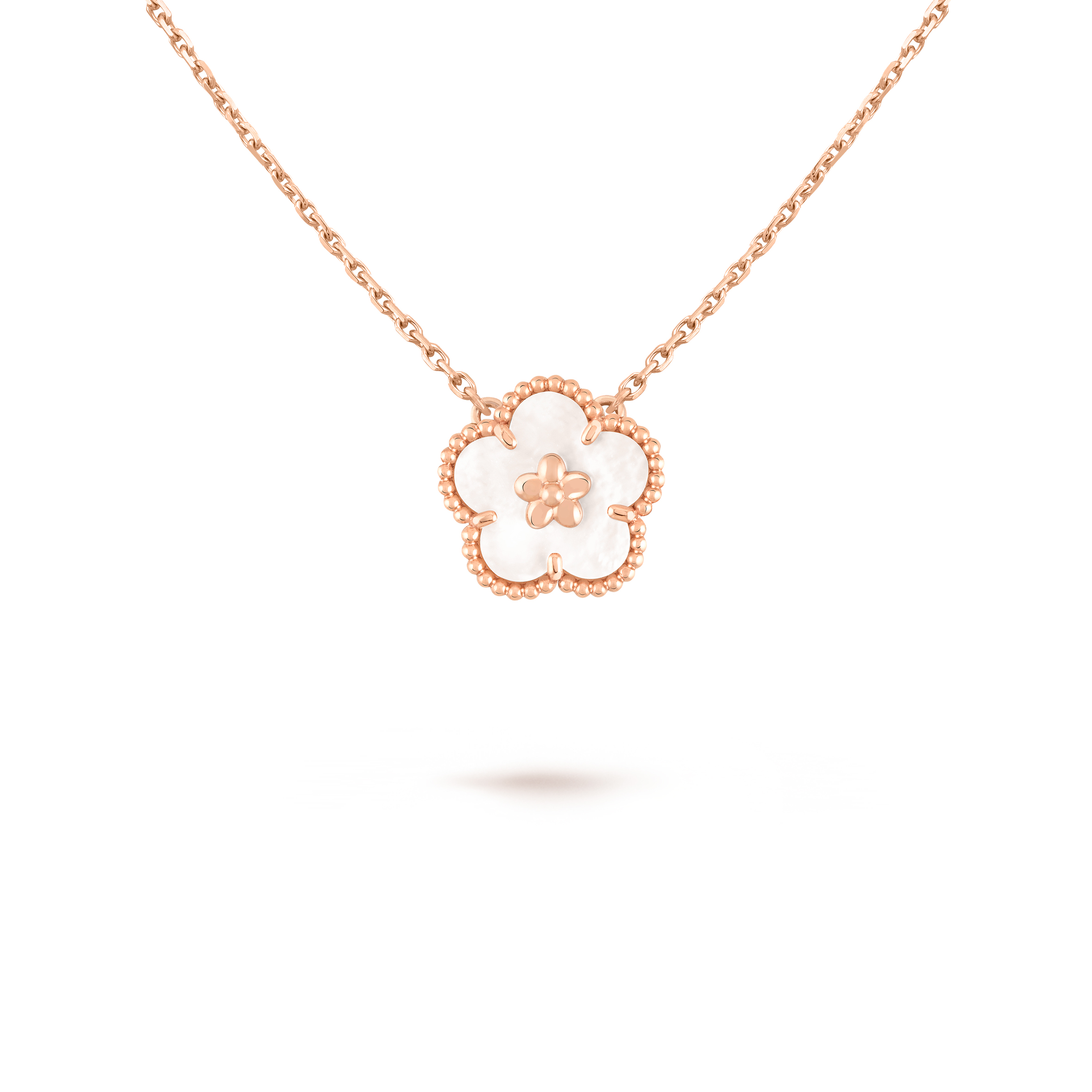 VAN CLEEF ARPELS LUCKY SPRING PENDANT, PLUM BLOSSOM VCARP9X100